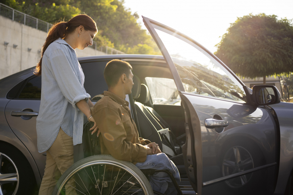 medium-shot-woman-man-wheelchair.jpg